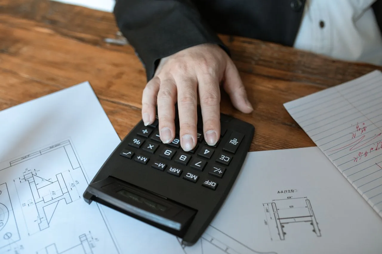 Illustration explaining how to calculating NIIT foreign interest, including Form 8960, Schedule B, IRC Section 988, foreign currency conversion, and international tax compliance.