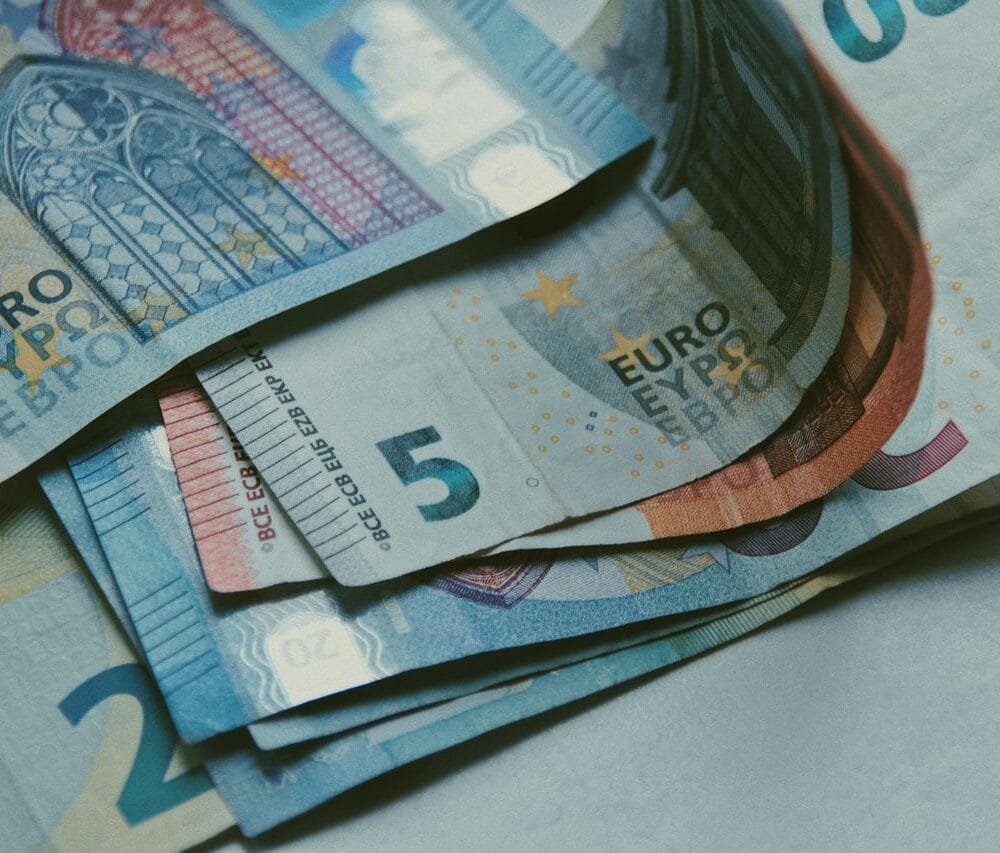 Illustration explaining how foreign interest income is subject to the 3.8% Net Investment Income Tax (NIIT), including IRC Section 1411, Form 8960, Schedule B reporting, MAGI thresholds, and international tax compliance. Green Card