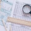 Illustration explaining the differences between Forms W-8BEN-E and W-8ECI, including FATCA classification, tax treaty benefits, effectively connected income (ECI), withholding tax rules, and IRS compliance.