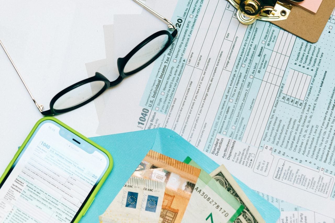 Illustration explaining IRS rules for tax-free foreign income, including the Foreign Earned Income Exclusion (FEIE), Form 2555, IRC Section 911, passive income, foreign bank interest, and international tax compliance.