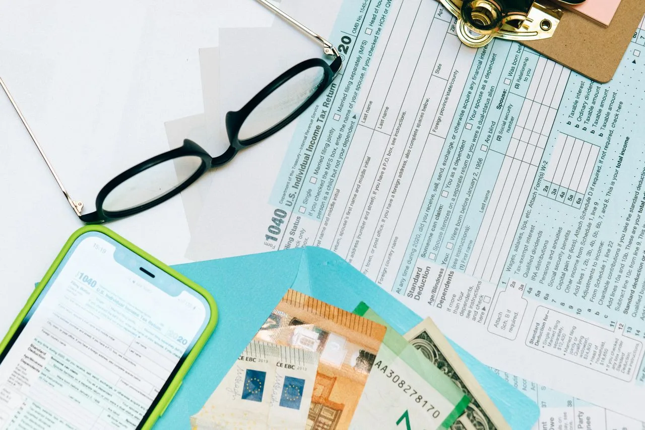 March 15 Alert: Don't Miss Your Schedule K-1 Deadline Illustration explaining IRS rules for tax-free foreign income, including the Foreign Earned Income Exclusion (FEIE), Form 2555, IRC Section 911, passive income, foreign bank interest, and international tax compliance. K-1