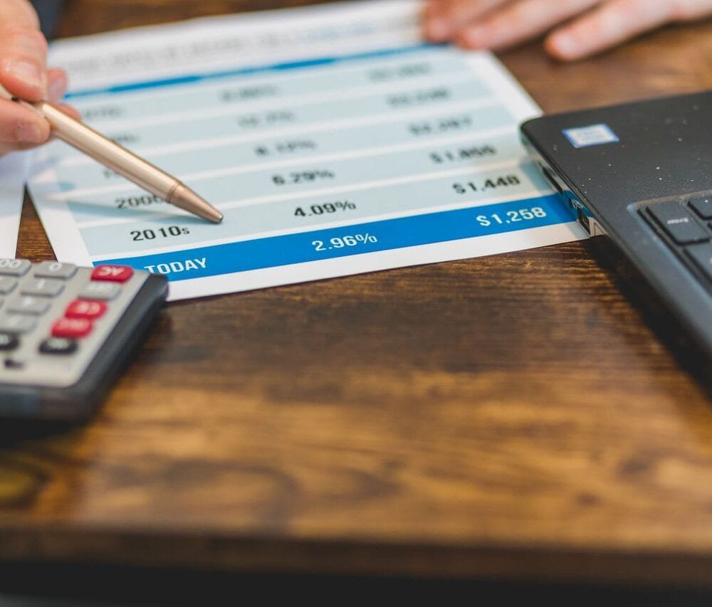 Illustration explaining how to maximize investment interest deductions, including debt tracing, Form 4952, capital gains elections, margin loans, and IRS tax rules.
