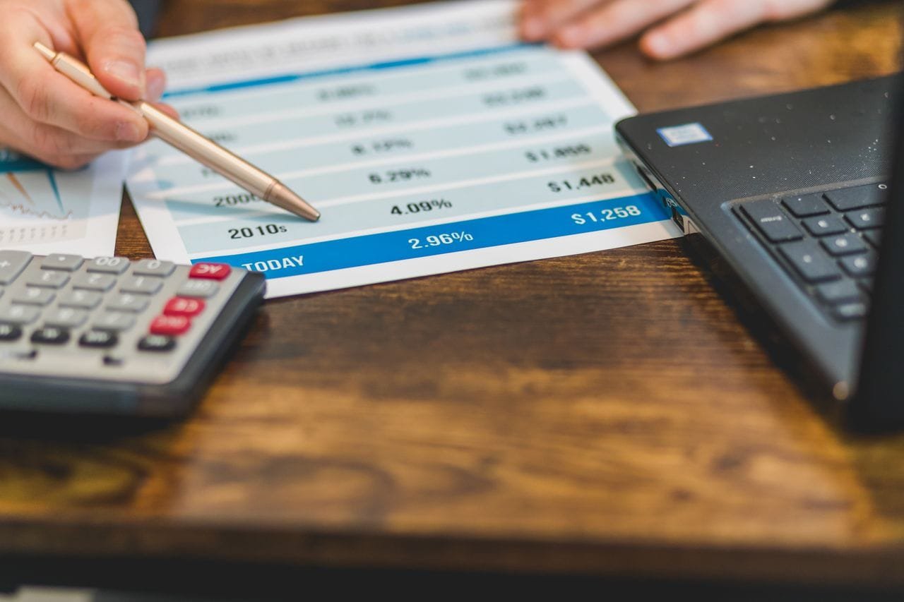 Illustration explaining how investment interest expense affects Net Investment Income Tax (NIIT), including Form 4952, Form 8960, IRC Sections 1411, 163(d), 861, foreign investments, and international tax compliance.